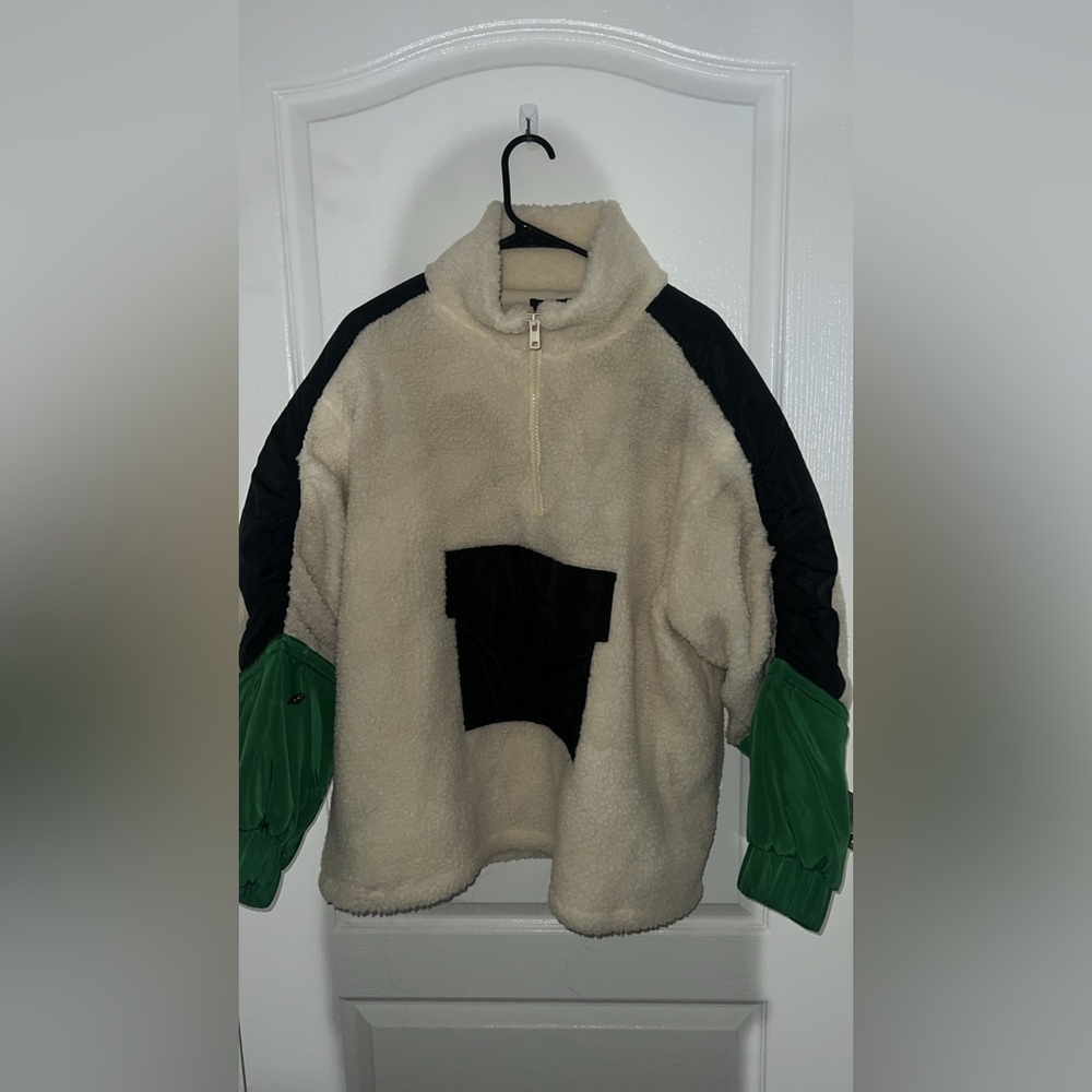 Cozy Cream and Black Fleece Pullover with Green Sleeves